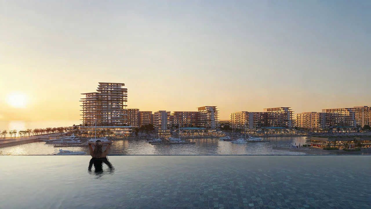 Golden sunset over the proposed Batumi marina and waterfront residences, seen across an infinity pool